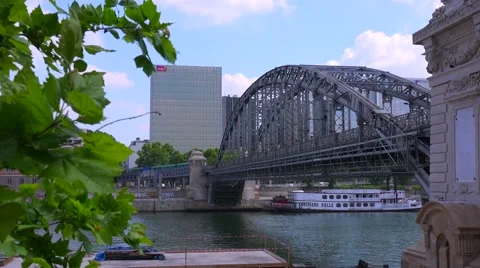 A subway train crosses a bridge in Paris. Stock Footage 41579832