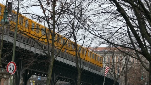 Subway train crossing elevated Bridge in Berlin 스톡 동영상 99920963