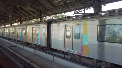 A subway train departs from platform of metro station in Mumbai, India Stock Footage 313214365