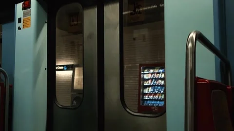 Subway Train Doors Moving Through a Station in Lisbon 库存影片 334353716