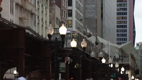 Subway Train on Elevated track in the Loop of Chicago City. Public transport Stock Footage 172218316