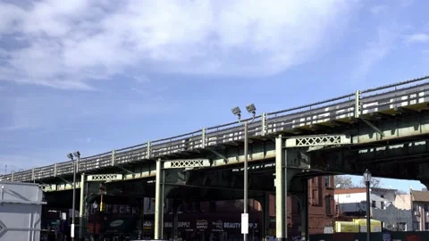Subway Train on elevated train tracks in NYC. Subway passing by Stock Footage 200797272