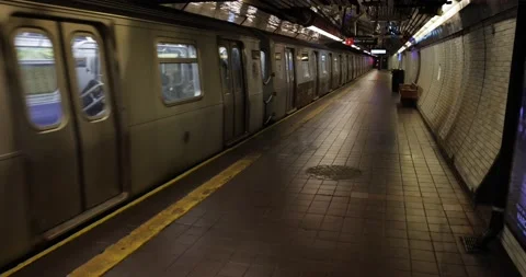 Subway train full of passengers departs from an empty platform Rosevelt Island Stock Footage 237016576
