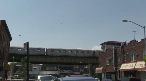 Subway train increases speed elevated Brooklyn.mxf Stock Footage 40192890