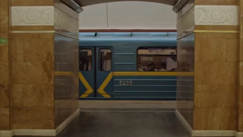 The subway train leaves the platform of the station, Slow Motion 100fps 2.8k Stock Footage 198383246