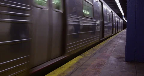Subway Train Leaving at Platform in Manhattan, New York Stock Footage 243364374