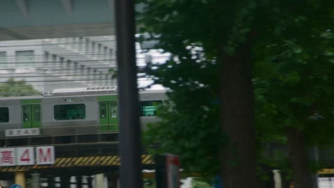 Subway train on the overpass in Japan Stock Footage 92299529