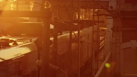 Subway Train passing bridge on the bridge which is located next to the highway 스톡 동영상 160480449