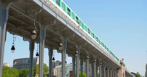 Subway Train Passing Over The Bir Hakeim Bridge At Daytime In Paris Stock Footage 156700307