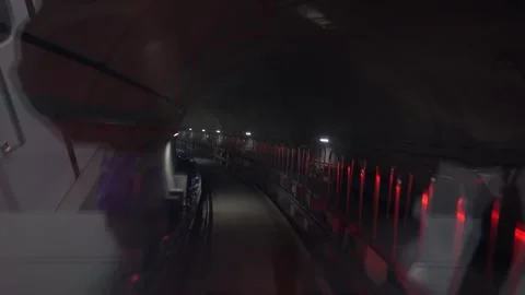 Subway train passing through an underground tunnel Stock Footage 332644005