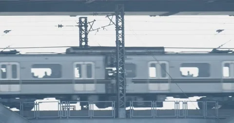 Subway train passing under a bridge Video stock 229909342