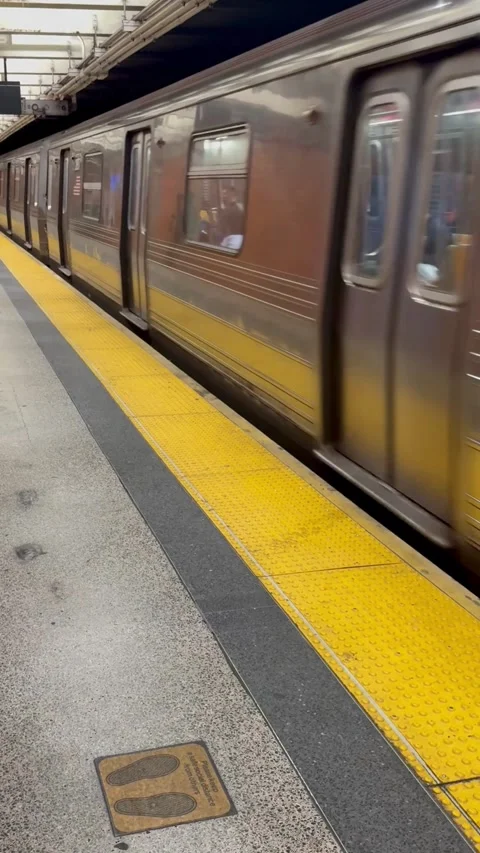 Subway Train at Platform with Yellow Edge Stock Footage 344601390