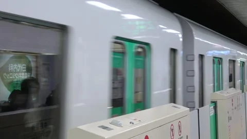 A subway train is pulling into the station, Hokkaido, Japan, 2025.04.28. Stock Footage 307945142