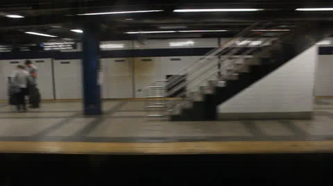 Subway train pulls into New York City station Stock Footage 25682184