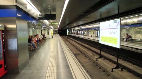 Subway train pulls into station in Barcelona Stock Footage 38211333