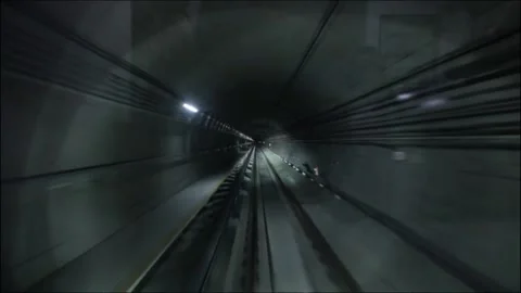 Subway train riding in a dark underground tunnel 스톡 동영상 133388486