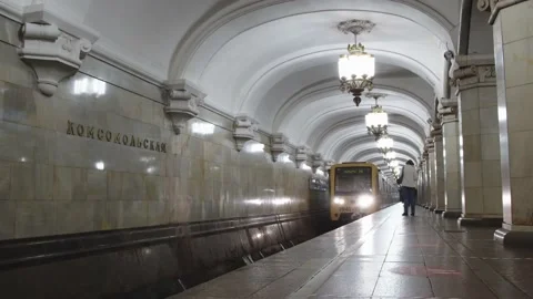 Subway train with the title in russian, means route 24, is arriving to the metro Stock Footage 202049689