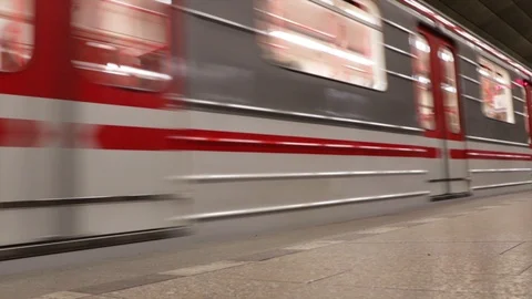 Subway (underground) with red and white stripes arriving at the station. Stock Footage 101981131