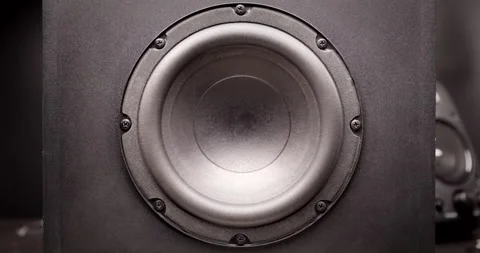 Subwoofer membrane moving to high volume music Stock Footage 165986215