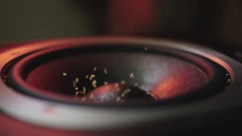 The subwoofer speaker vibrates while playing the deep bass of a music Video stock 287270356