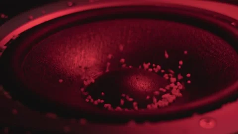 The subwoofer speaker vibrates while playing the deep bass of a music Video stock 287270418