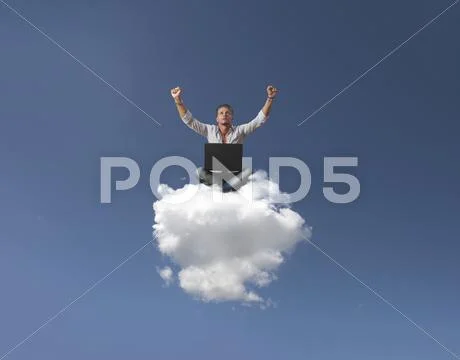 Success of a businessman over a cloud Stock Photos
