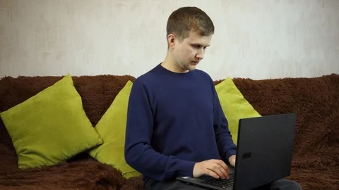 Success came to a young guy! The young man answers the call, the deal was succes Stock Footage 99403719