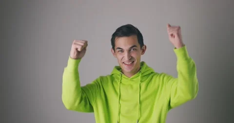 Success, emotion and expression concept - happy young caucasian man celebrating Stock Footage 148396020