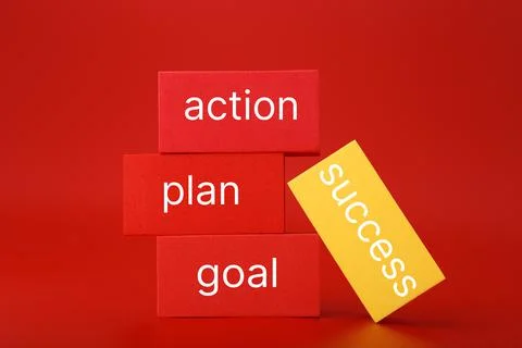 Success formula or strategy concept in red colors. Goal, plan, action written on Stock Photos