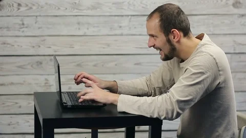 The success of freelancer working at the computer Stock Footage 98404681