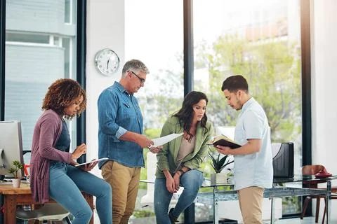 Success is gained through shared ideas. a group of creative colleagues Stock Photos