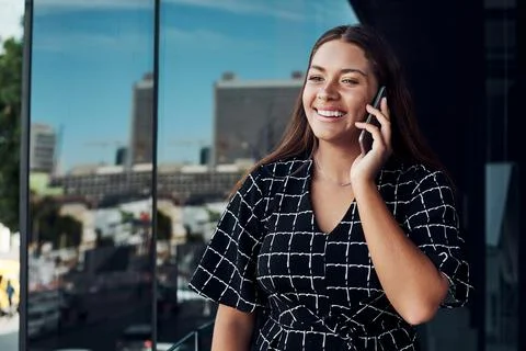 Success keeps calling her Stock Photos