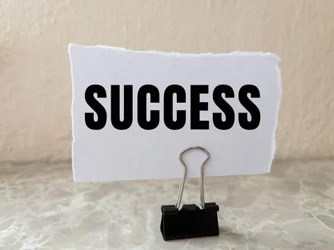 Success message written on ripped torn paper background. Conceptual Success.. Foto stock