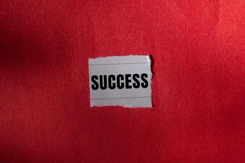 Success message written on ripped torn paper background. Conceptual Success.. Stock Photos