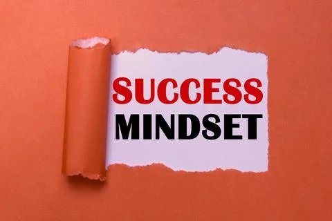 Success Mindset Concept on Torn Red Paper Foto stock