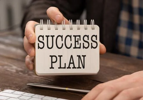 Success Plan text concept write on a notebook on wooden background Stock-Fotos
