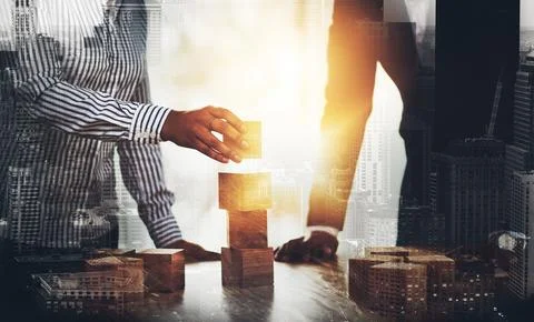 Success starts by building a solid foundation. two unrecognizable businesspeople Stock Photos