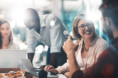 Success is a team task. colleagues collaborating on a project in a modern office Stock Photos