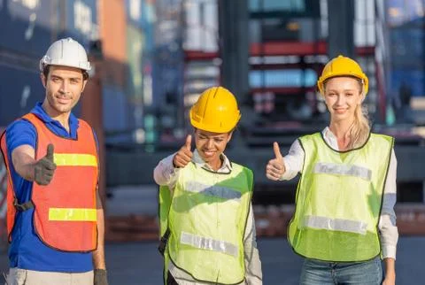 Success Teamwork Concept, engineer and worker team smiling with giving thumbs up 스톡 사진