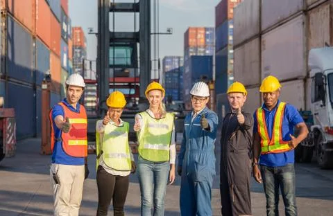 Success Teamwork Concept, engineer and worker team smiling with giving thumbs up Fotos Stock