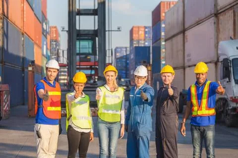 Success Teamwork Concept, engineer and worker team smiling with giving thumbs up Stockfoto's