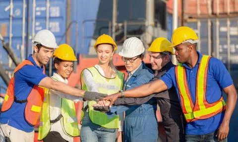 Success Teamwork Concept, engineer and worker team joining hands Foto stock