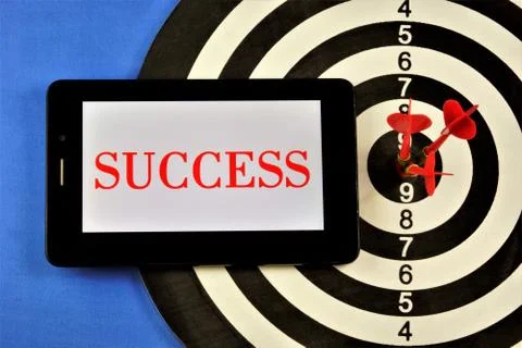 Success - text message on a tablet computer. Stock Photos