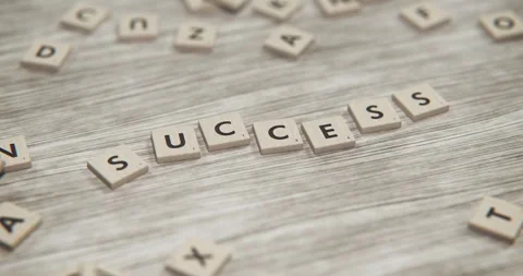 Success Tiles moving around the table Stock Footage 251140481