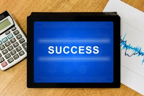 Success word on digital tablet Stock Illustration