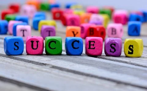Success word on table Stock Photos