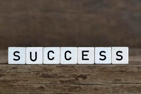 Success, written in cubes Stock Photos