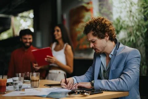 Successful Architects and Engineers Collaborating on Urban Planning Project Stock Photos