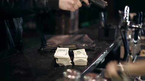Successful bar robbery. The robber breaks into a bar and takes the money Stock Footage 43877538