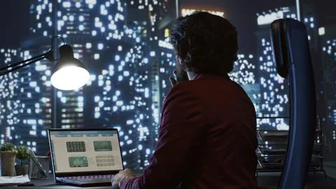 Successful billionaire examining analytics to develop company Stock Photos
